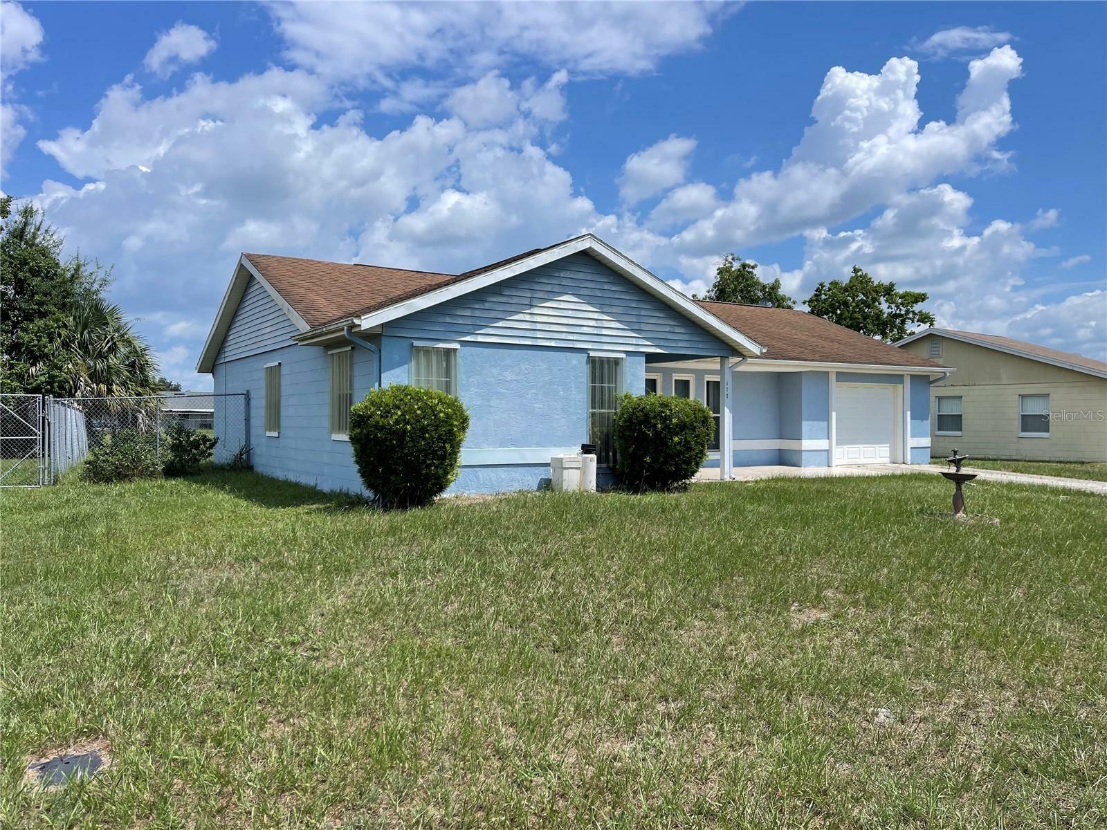 Property Photo:  177 E Cedarwood Circle  FL 34743 