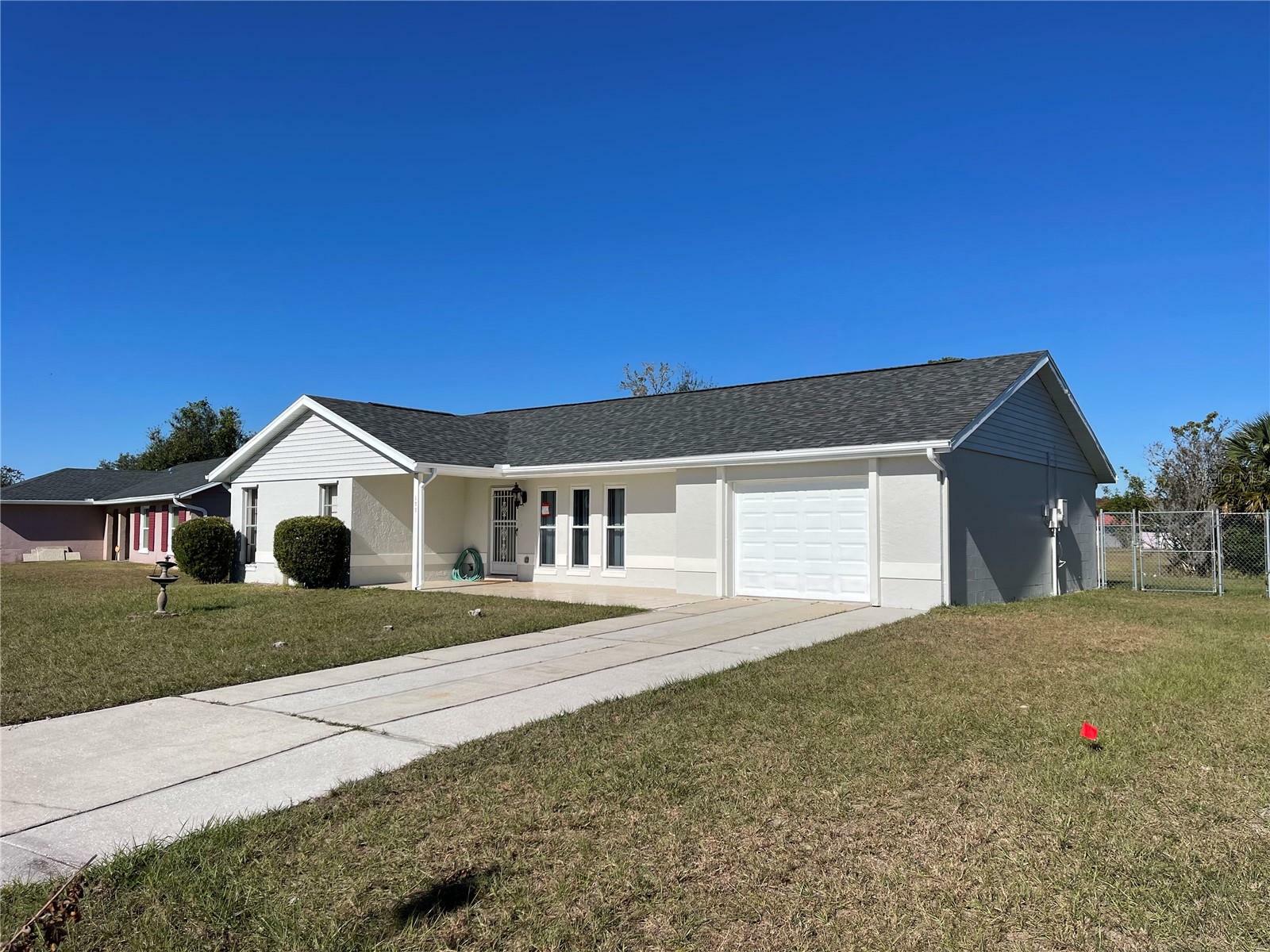 Property Photo:  177 E Cedarwood Circle  FL 34743 