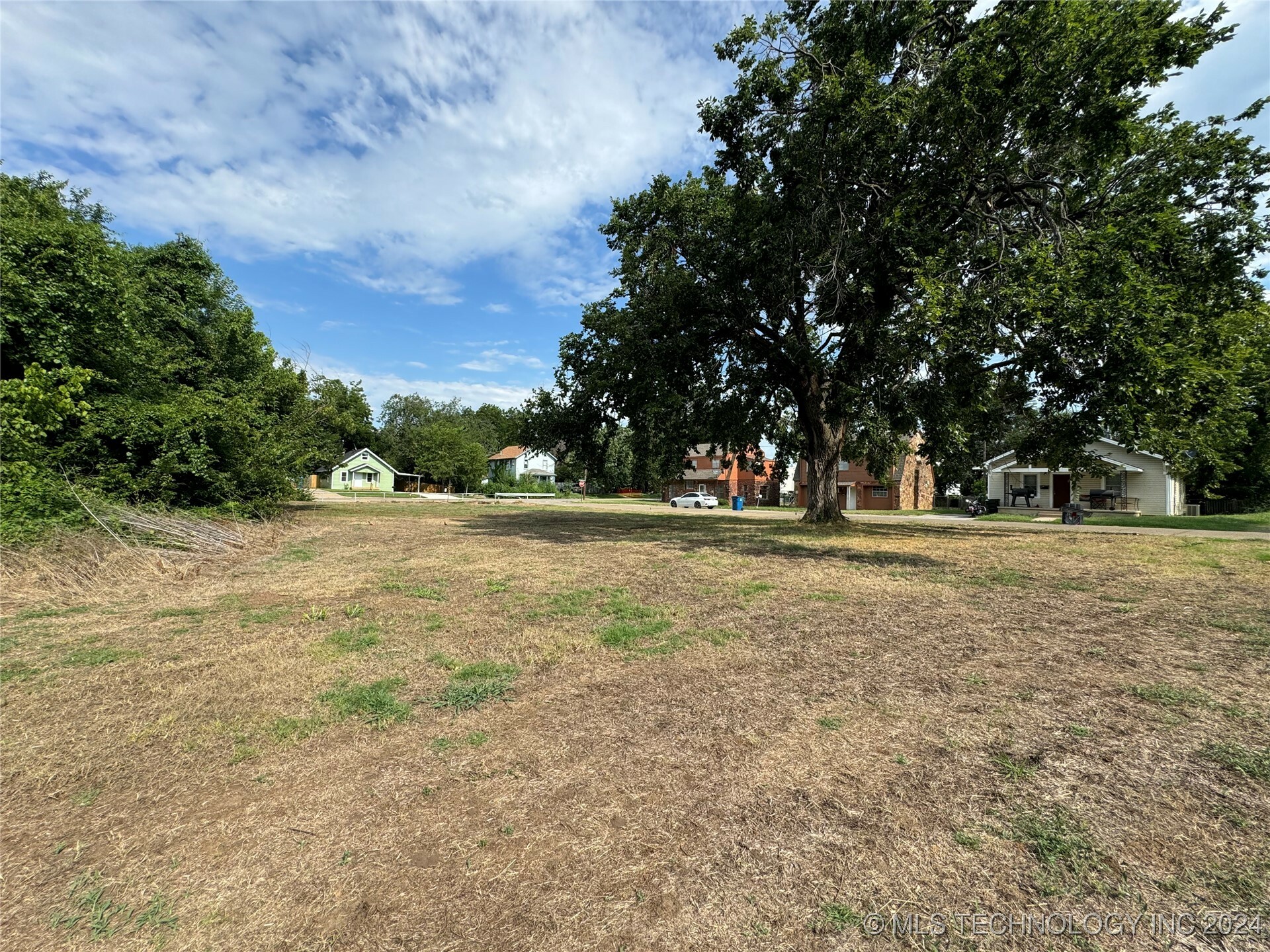 Property Photo:  203 E 2nd  OK 74023 