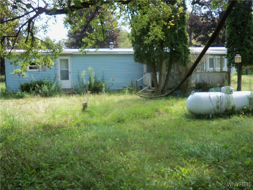 Property Photo:  6153 Route 16  NY 14737 