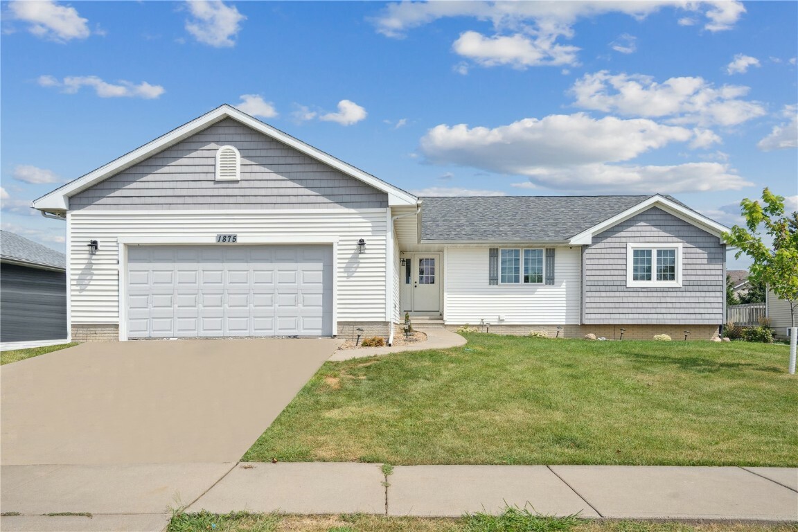 Property Photo:  1875 48th St Court  IA 52302 