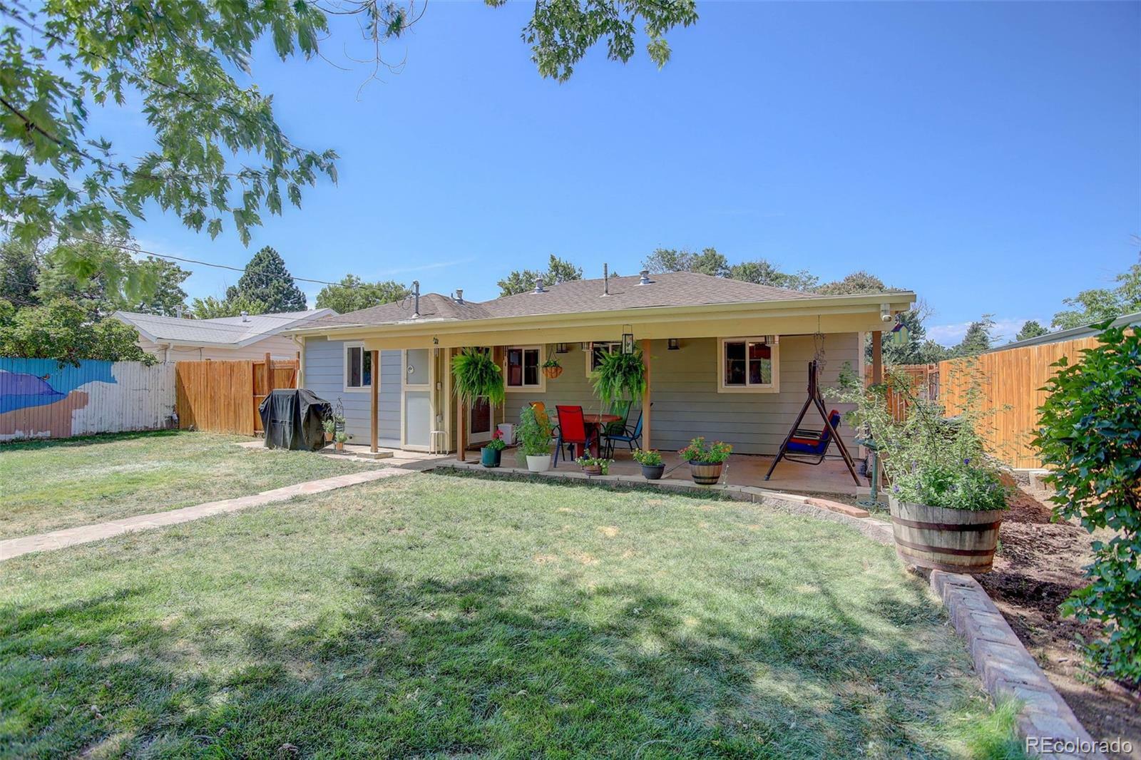 Property Photo:  1224 Xanadu Street  CO 80011 