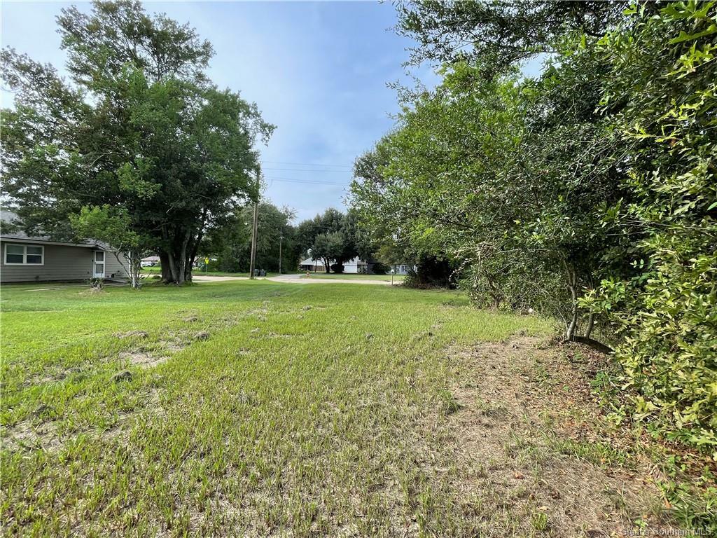 Property Photo:  2220 E Prien Lake Road E  LA 70601 