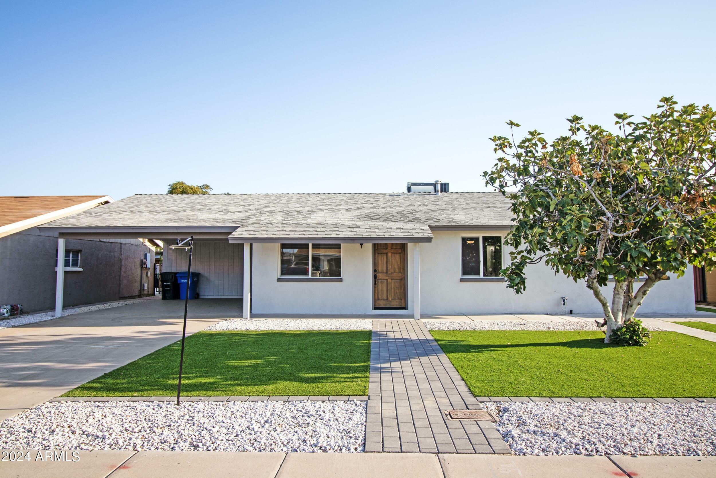 Property Photo:  7409 W Roma Avenue  AZ 85033 