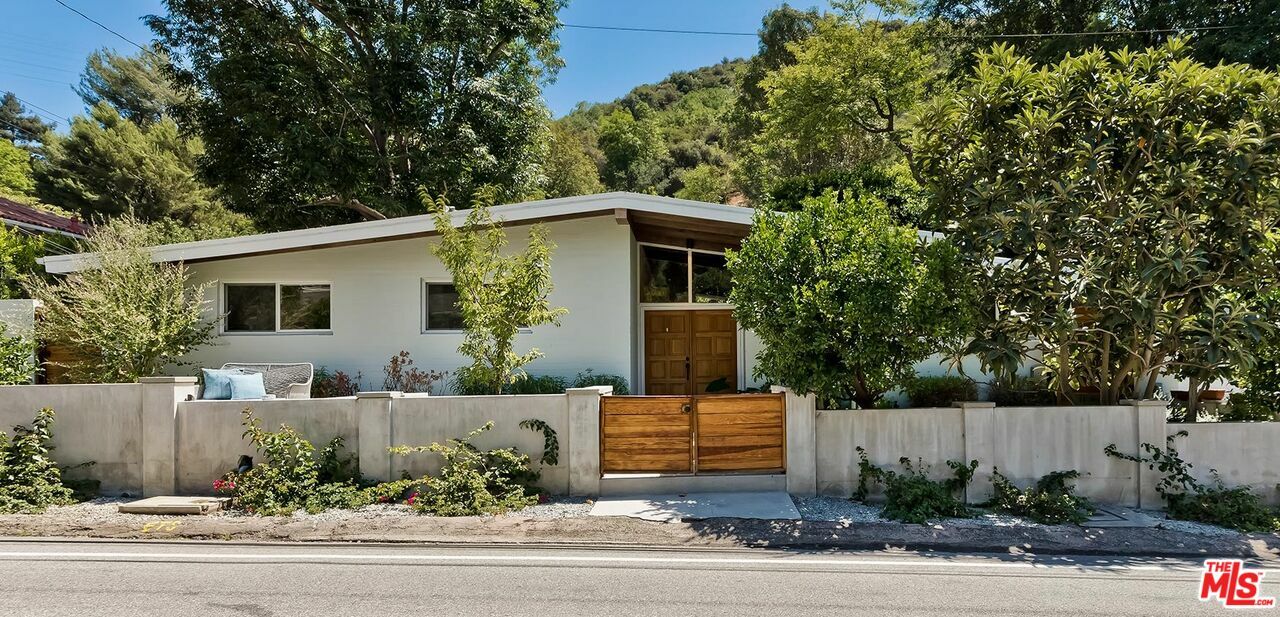 Property Photo:  3380   Mandeville Canyon Rd  CA 90049 