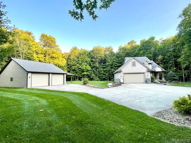 Property Photo:  1603 Deepwood Drive  MI 48446 