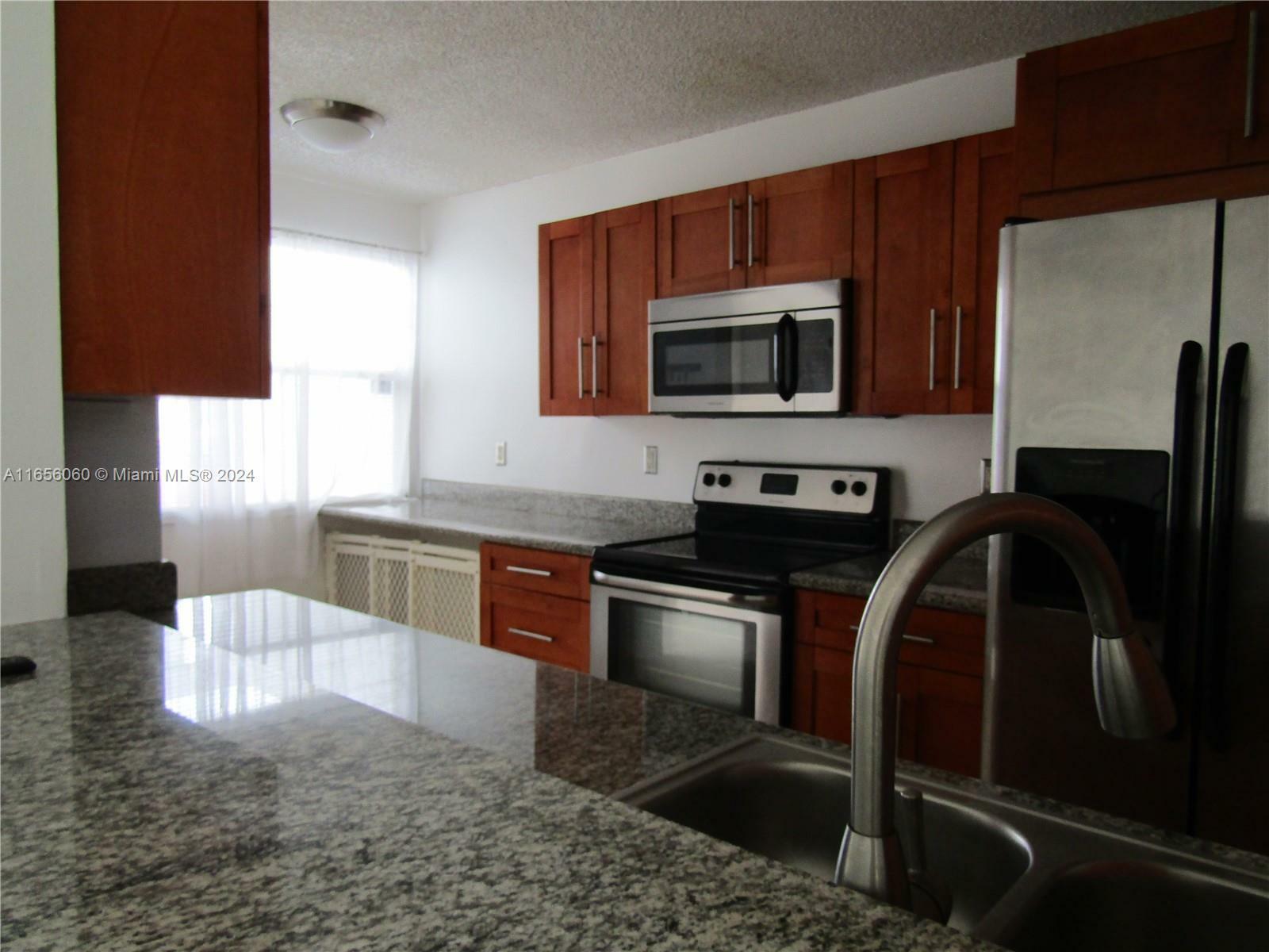 Property Photo:  9783 NW 49th Ter 426  FL 33178 