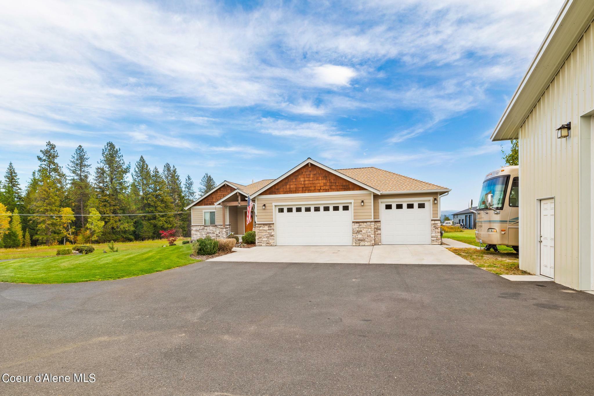 Property Photo:  704 E Chattaroy Rd  WA 99005 