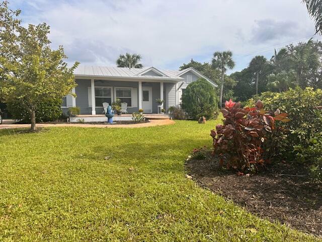 Property Photo:  229 SE Oriole Avenue  FL 34996 