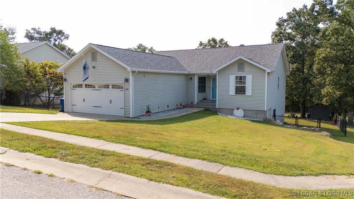 Property Photo:  324 Hollyhock Drive  MO 65020 