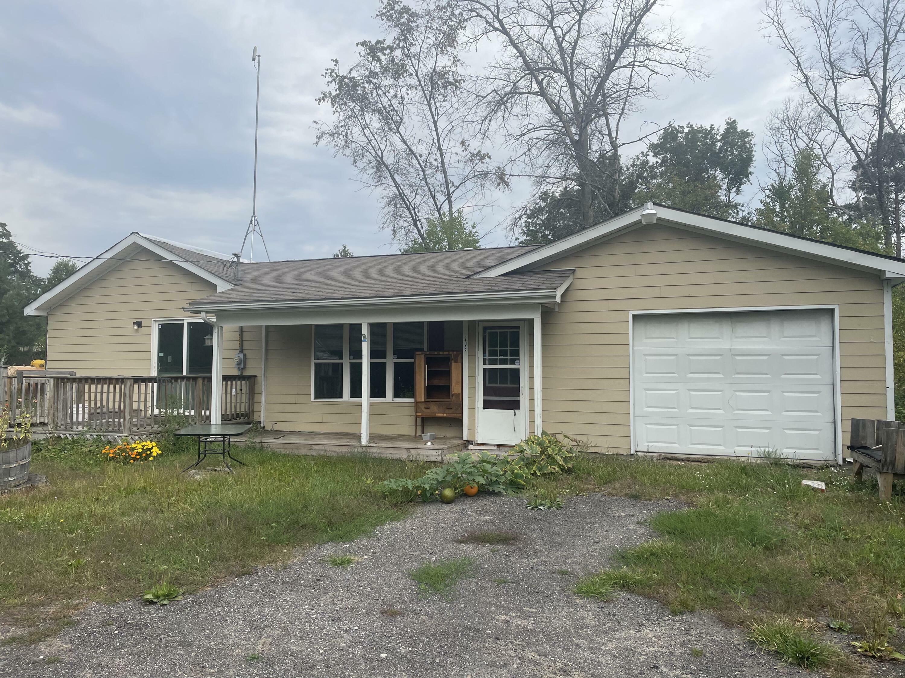 Property Photo:  206 Harland Drive  MI 48625 