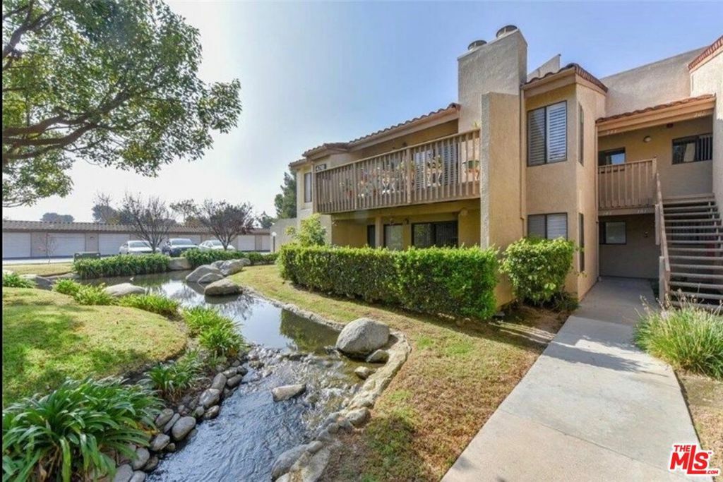 Property Photo:  4791 Lago Drive 103  CA 92649 