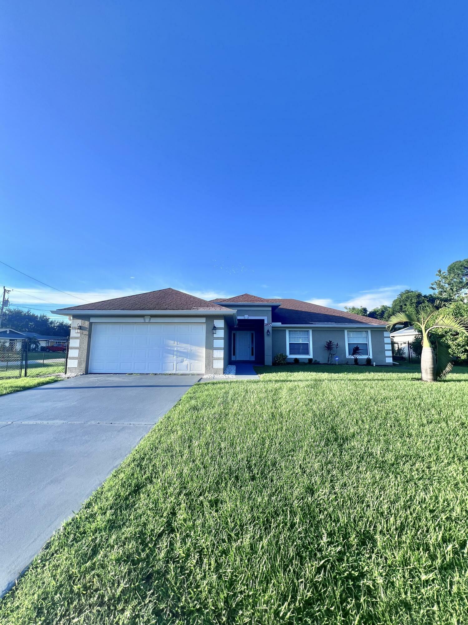 Property Photo:  1897 SW Lofgren Avenue  FL 34953 