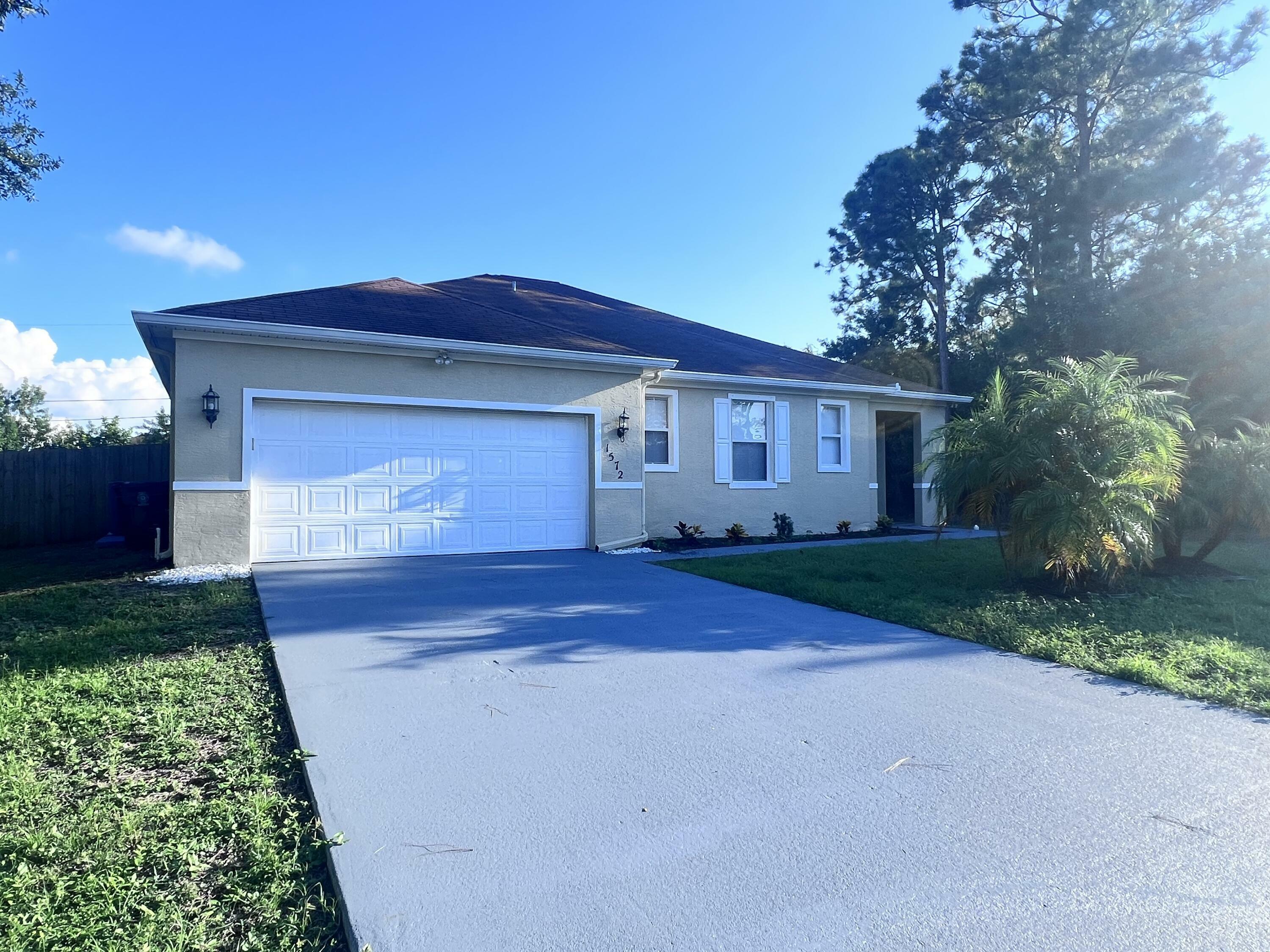 Property Photo:  1572 SW Gager Road  FL 34953 