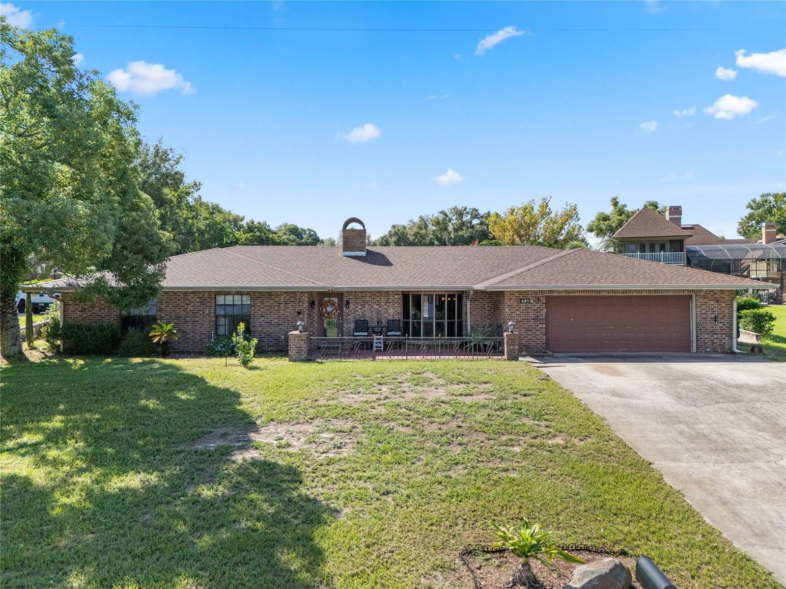 Property Photo:  687 W Lakeshore Drive  FL 34711 