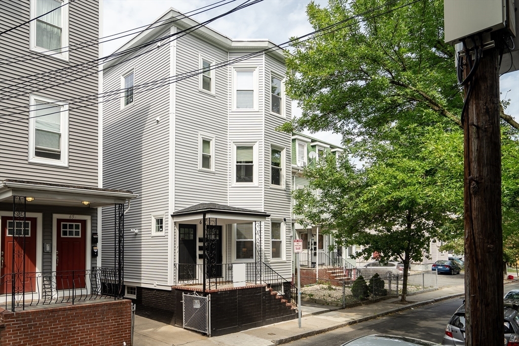 Property Photo:  63 Oak St 1  MA 02143 