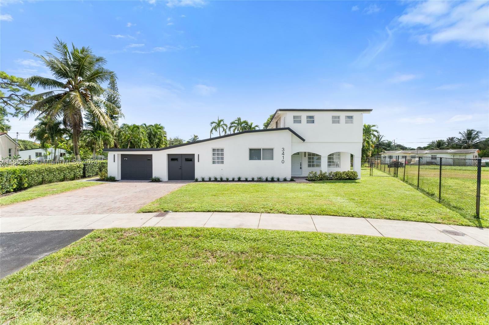 Property Photo:  3410 NW 8th Ct  FL 33311 