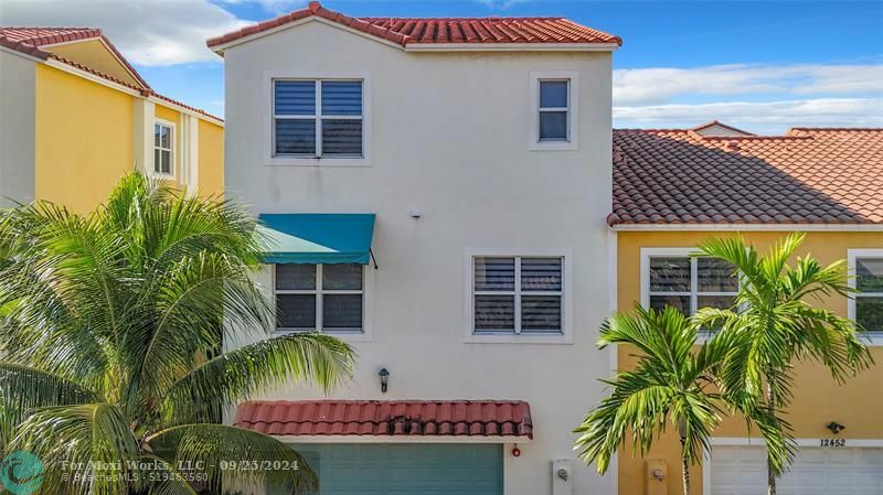 Property Photo:  12448 NW 17th Mnr  FL 33028 