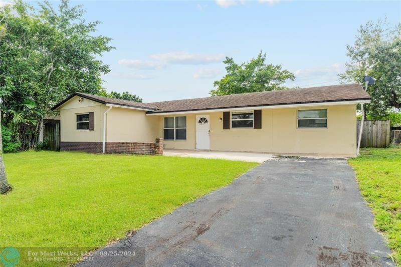 Property Photo:  6740 NW 6th Ct  FL 33063 