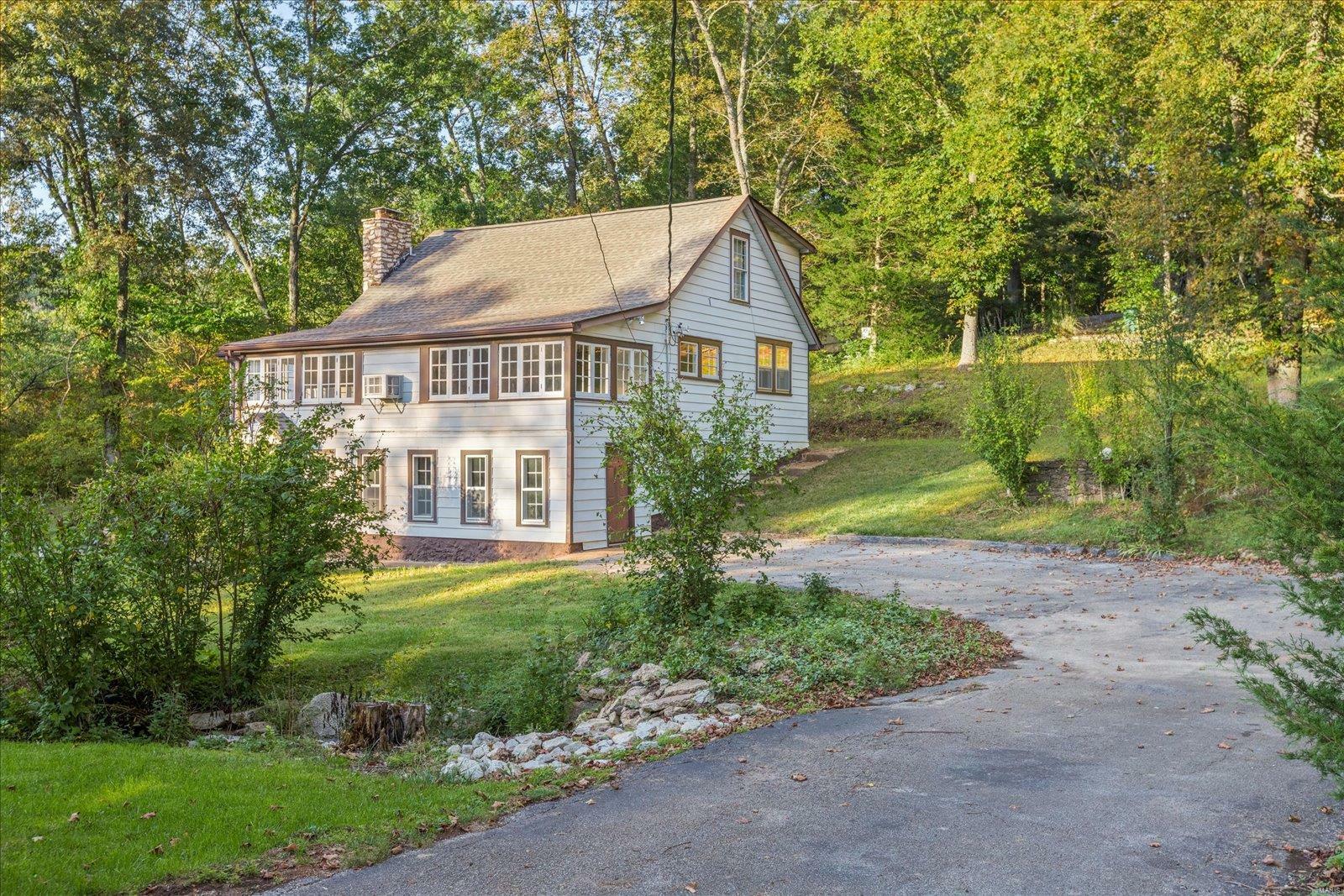 Property Photo: 25 Hillside Spgs MO 63025