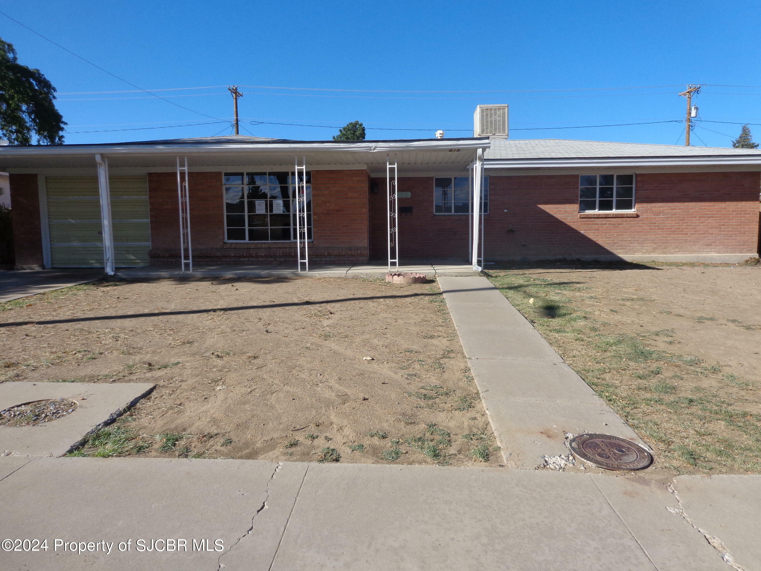 Property Photo:  212 W 27th Street  NM 87401 