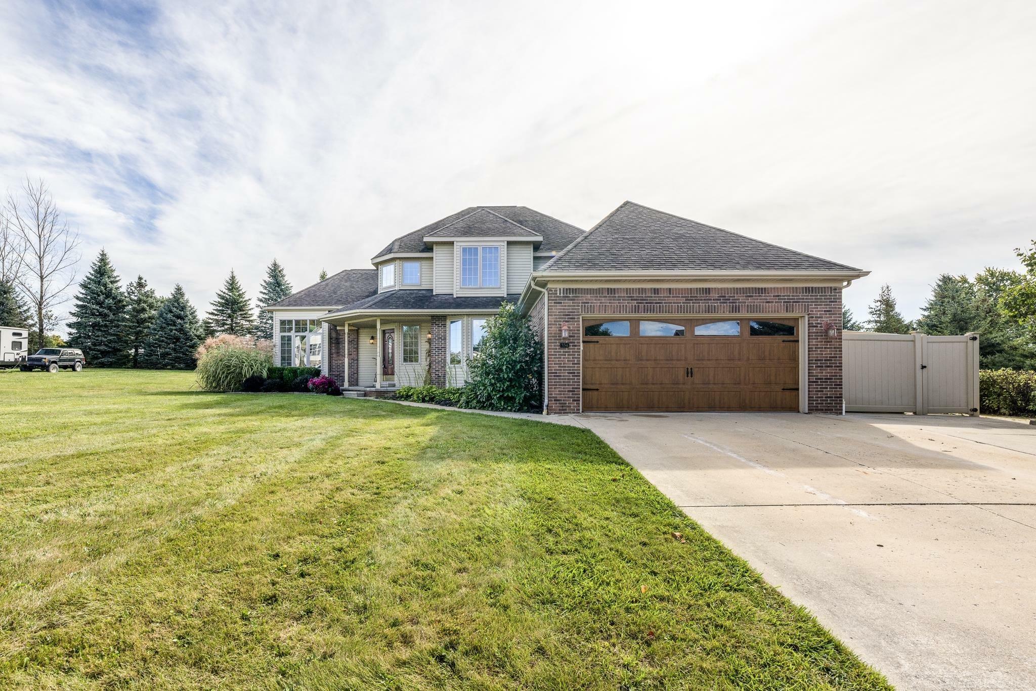 Property Photo:  334 Golfside Drive  MI 48446 