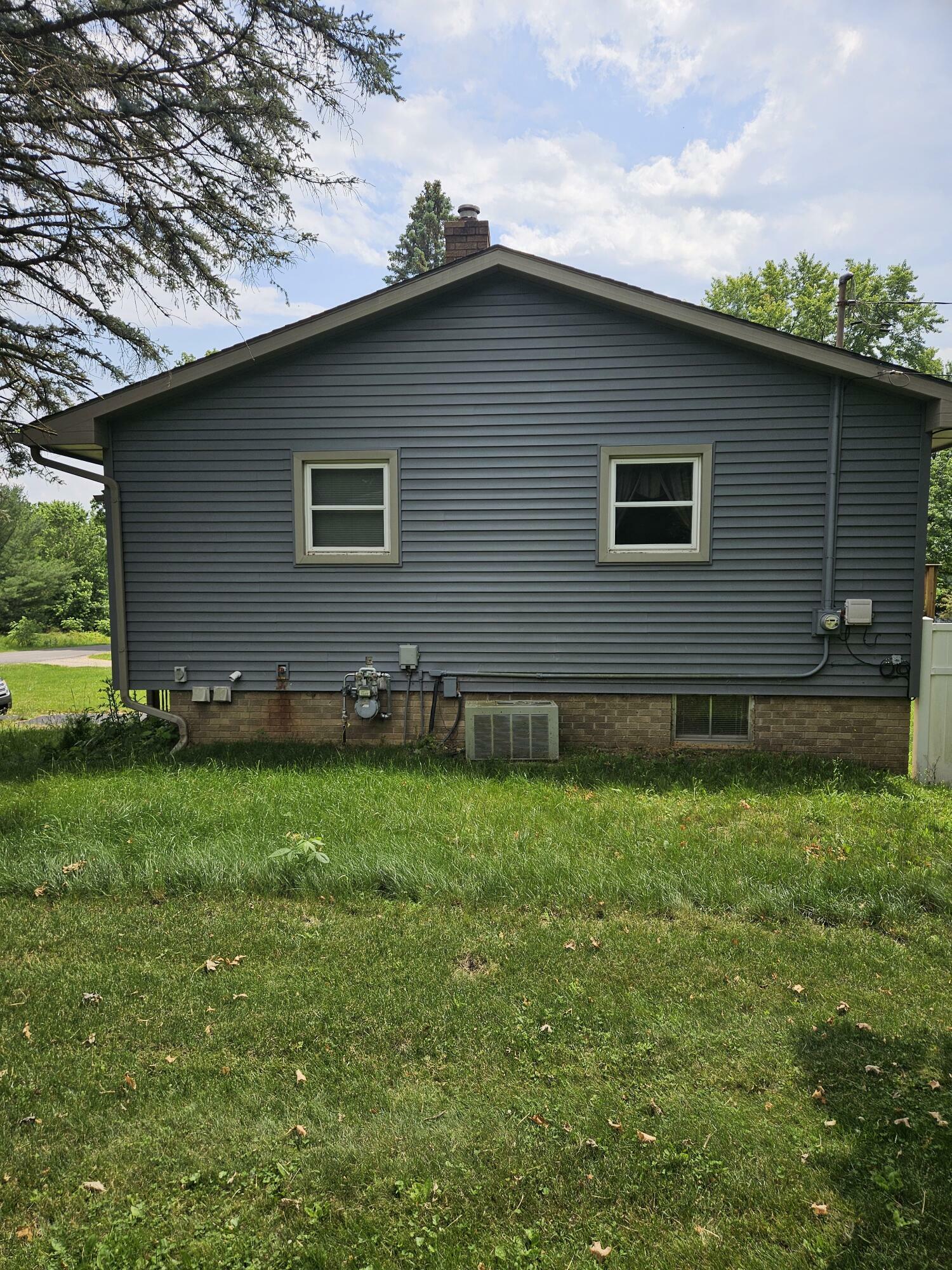 Property Photo:  1077 Gidner Road  MI 48813 