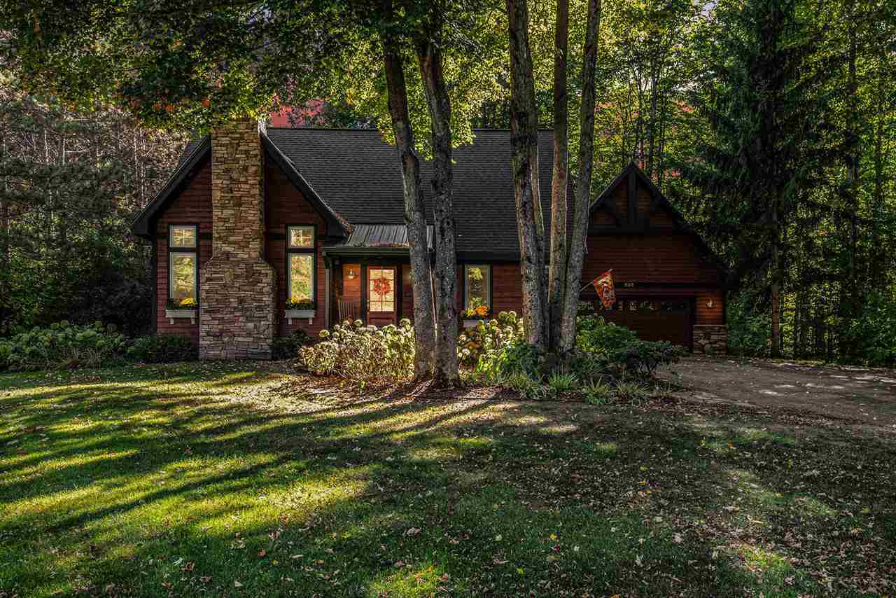 Property Photo:  235 Meadow Wood  MI 49740 