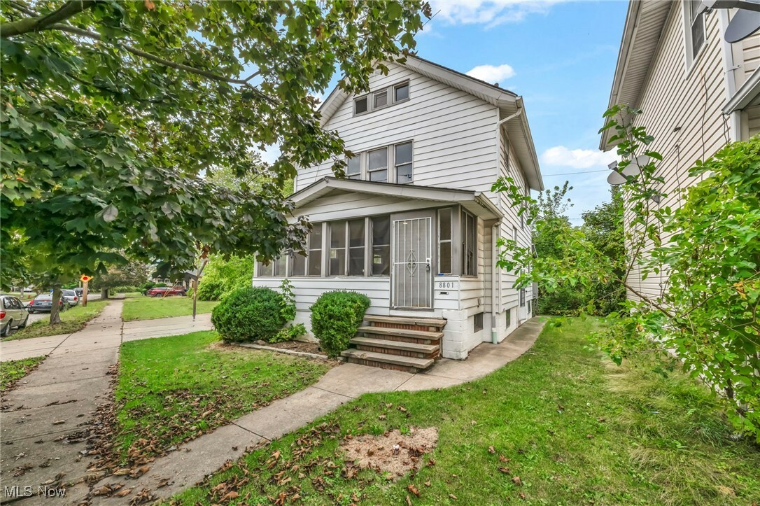 Property Photo:  8801 Macomb Avenue  OH 44105 