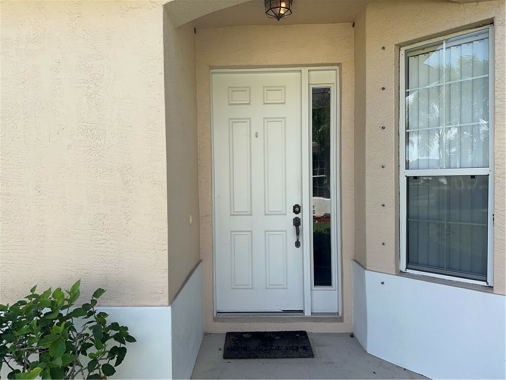 Property Photo: 413 W Tangerine Square SW FL 32968