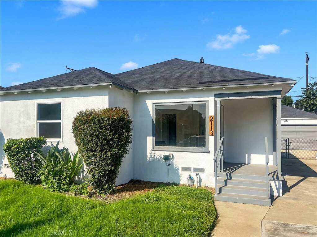 Property Photo:  2113 N Locust Avenue  CA 90221 