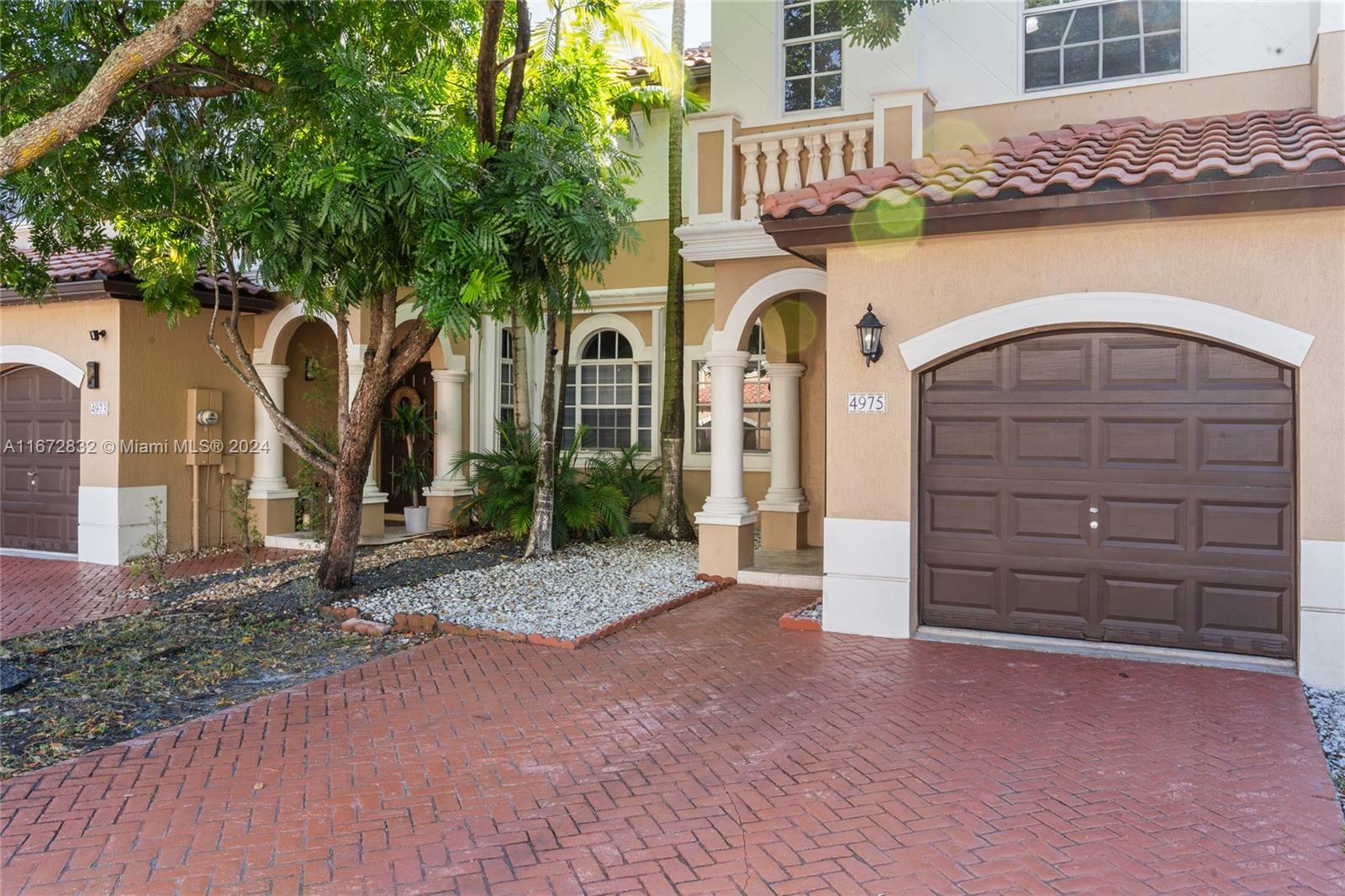 Property Photo:  4975 SW 127th Way 4975  FL 33027 