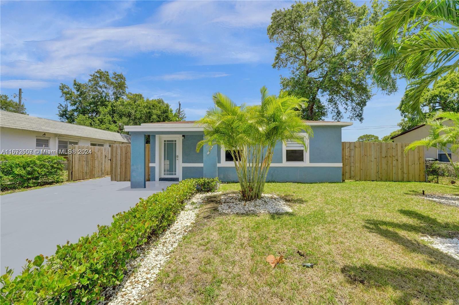 Property Photo:  878 NW 17th Ave (Front)  FL 33311 