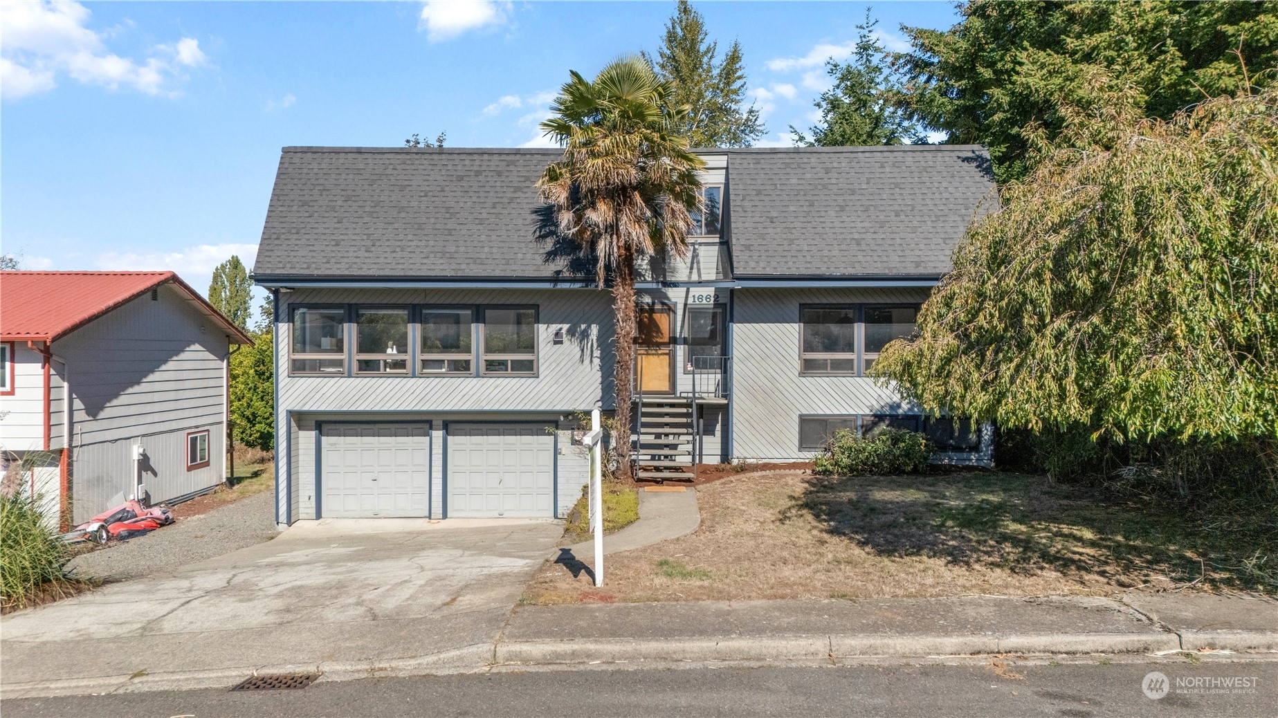 Property Photo:  1662 S 225th Street  WA 98198 