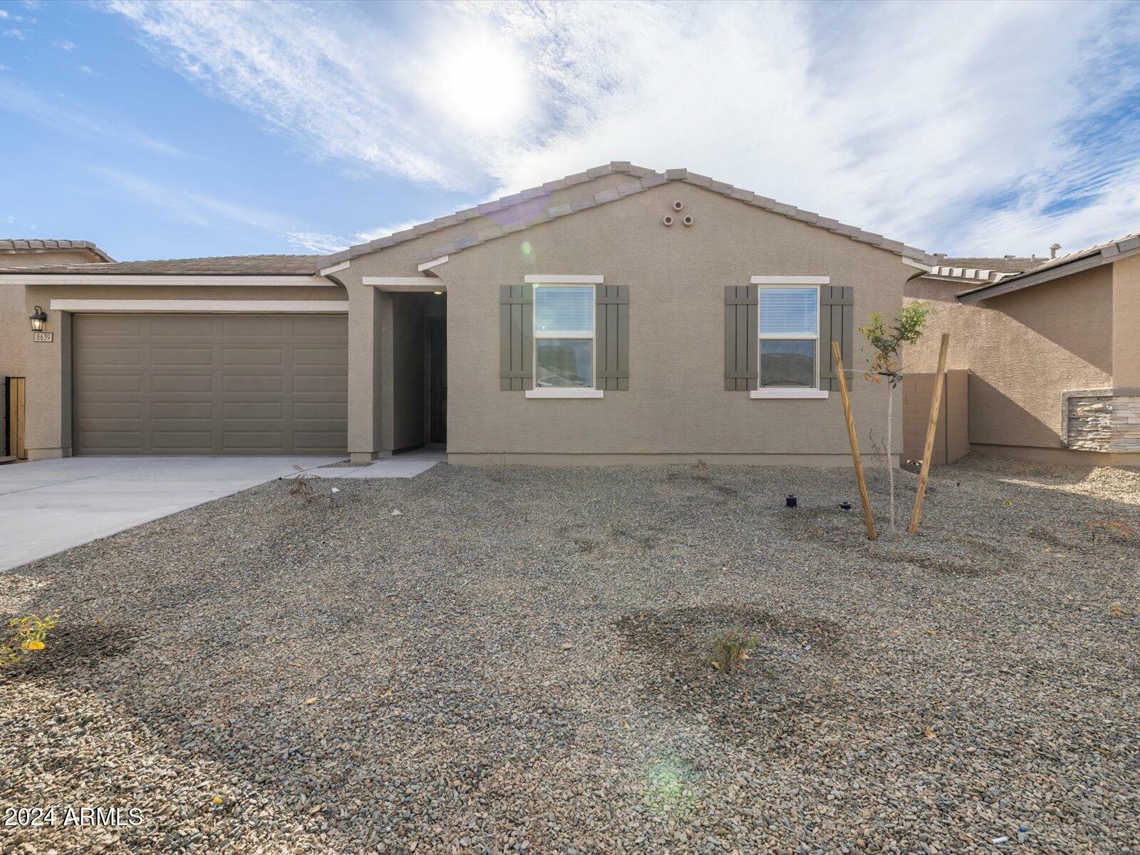 Property Photo:  8639 W Albeniz Place  AZ 85353 
