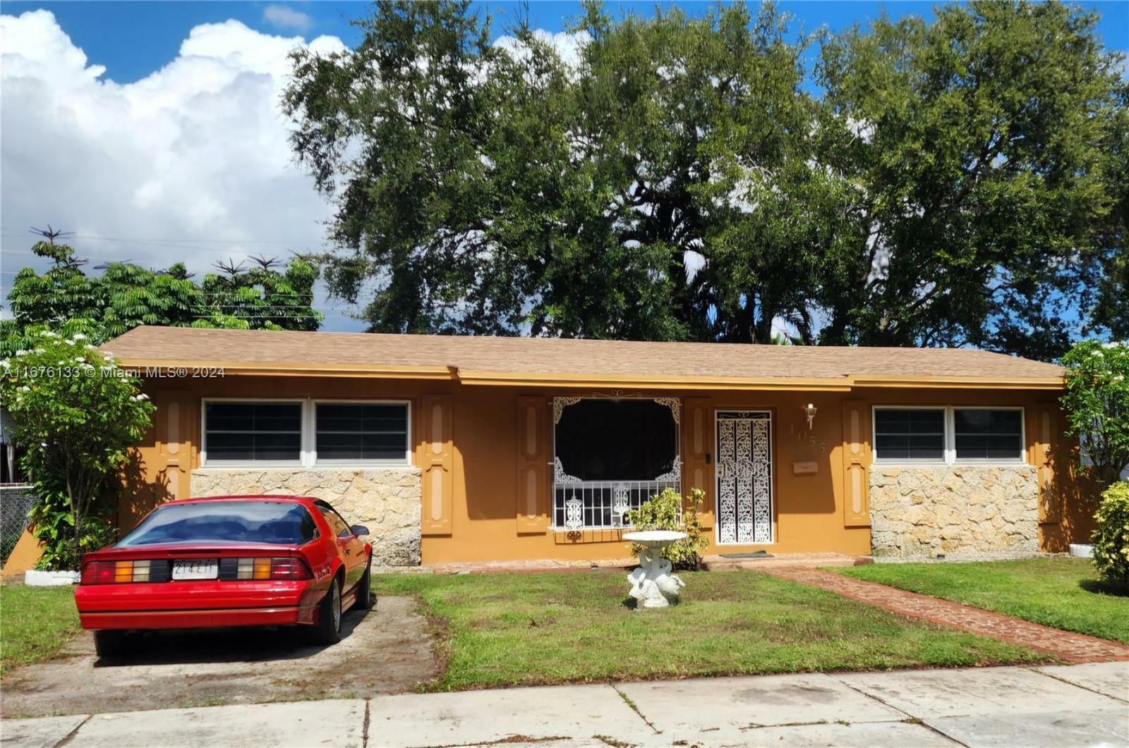 Property Photo:  1055 NW 57th St  FL 33127 