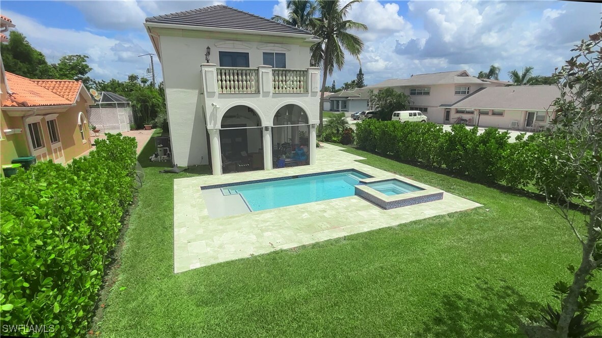 Property Photo: 11002 Vanderbilt Drive FL 34108