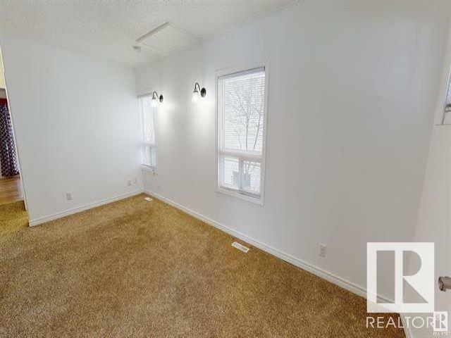 Property Photo:  11328 126 Street NW Street NW  AB T5M 0R4 