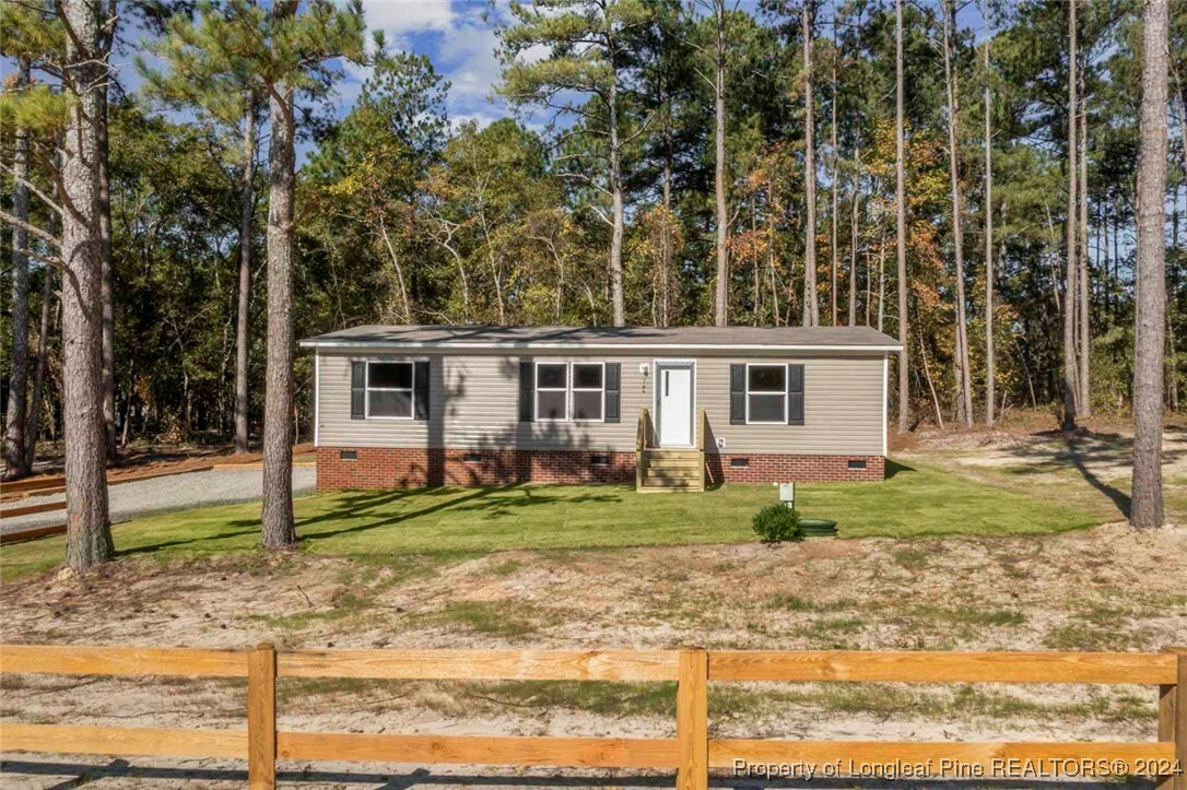 Property Photo:  704 Gilchrist Road  NC 28326 