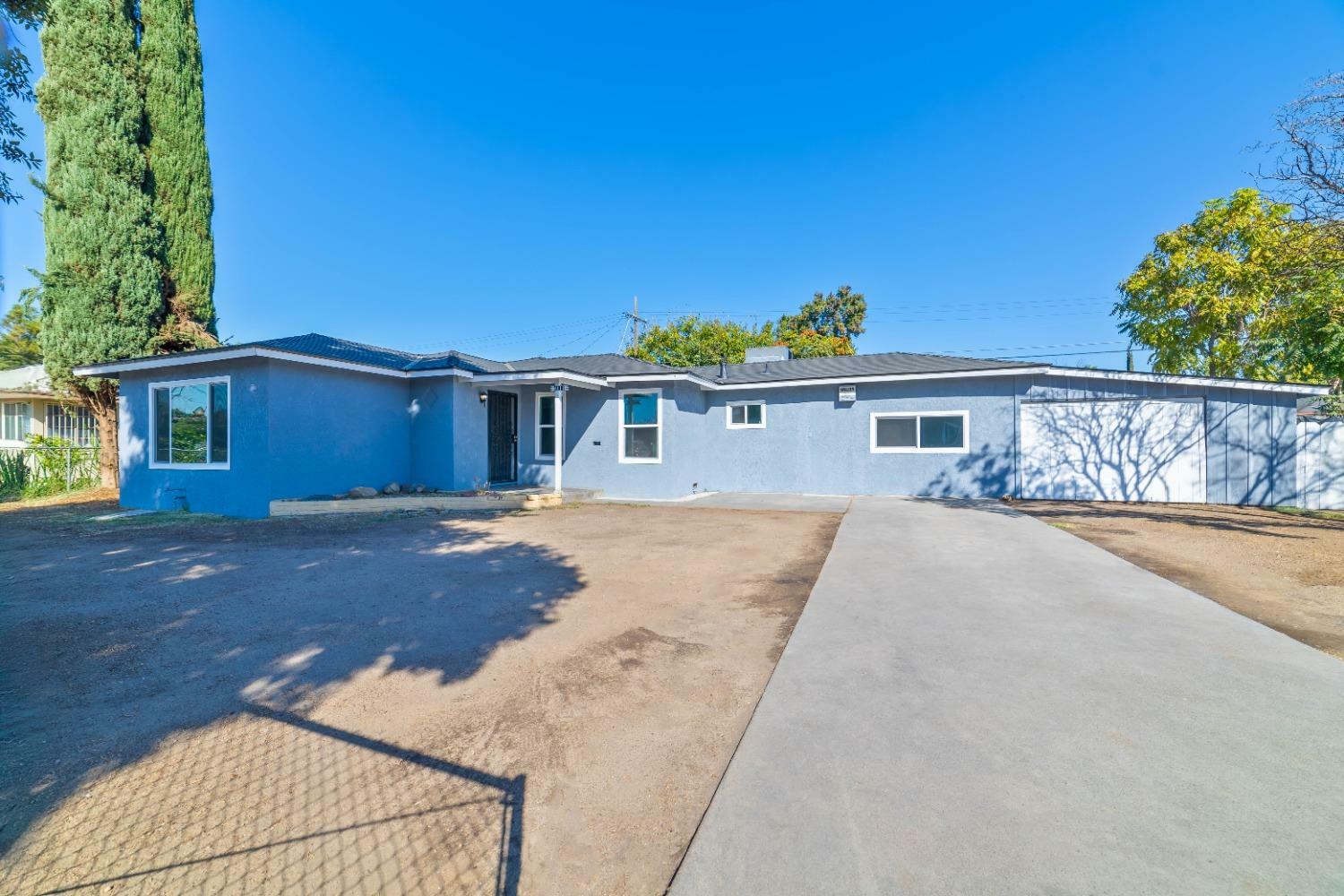 Property Photo:  4111 E White Avenue  CA 93702 