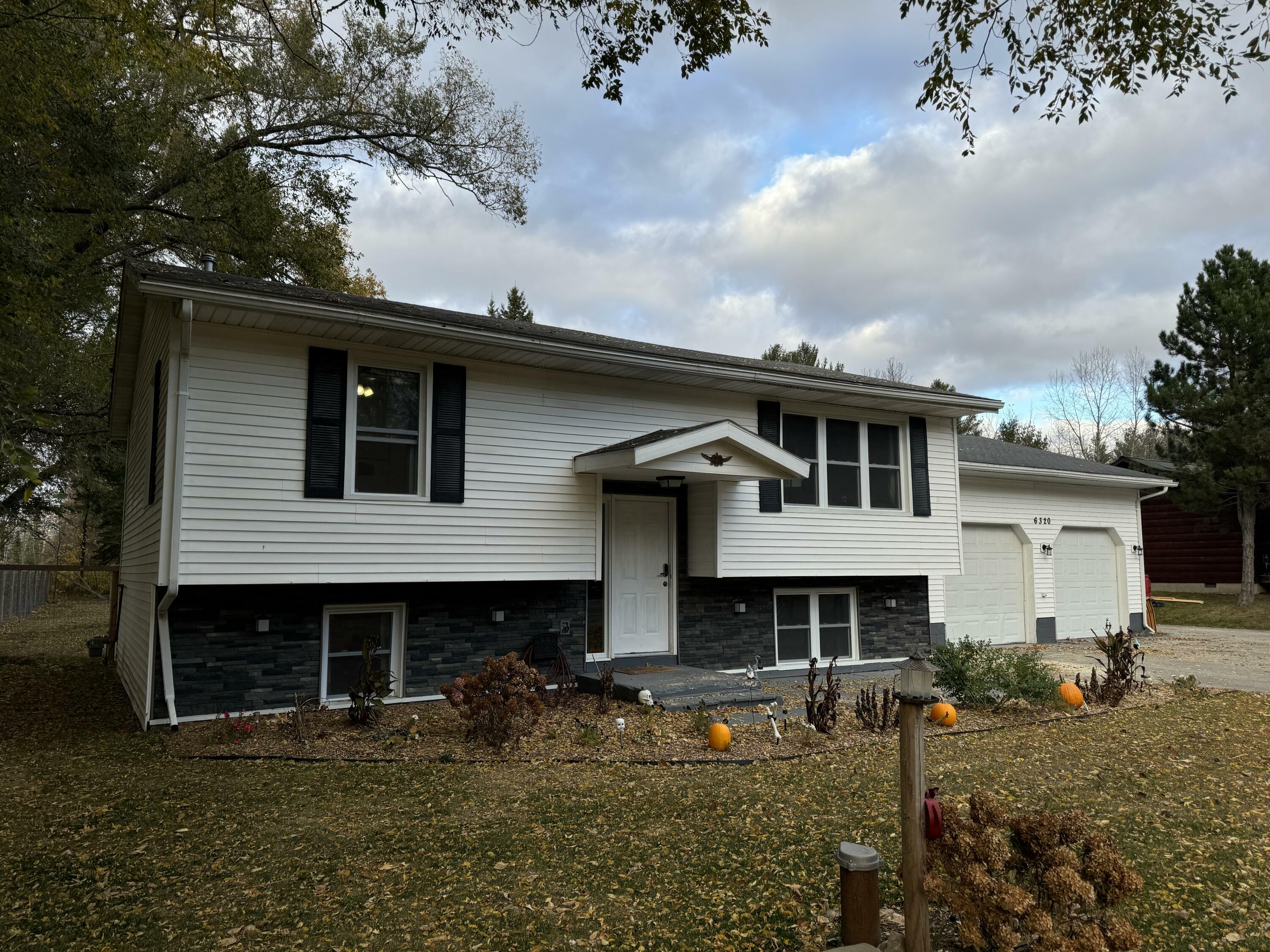 Property Photo:  6320 Long Rapids Road  MI 49707 