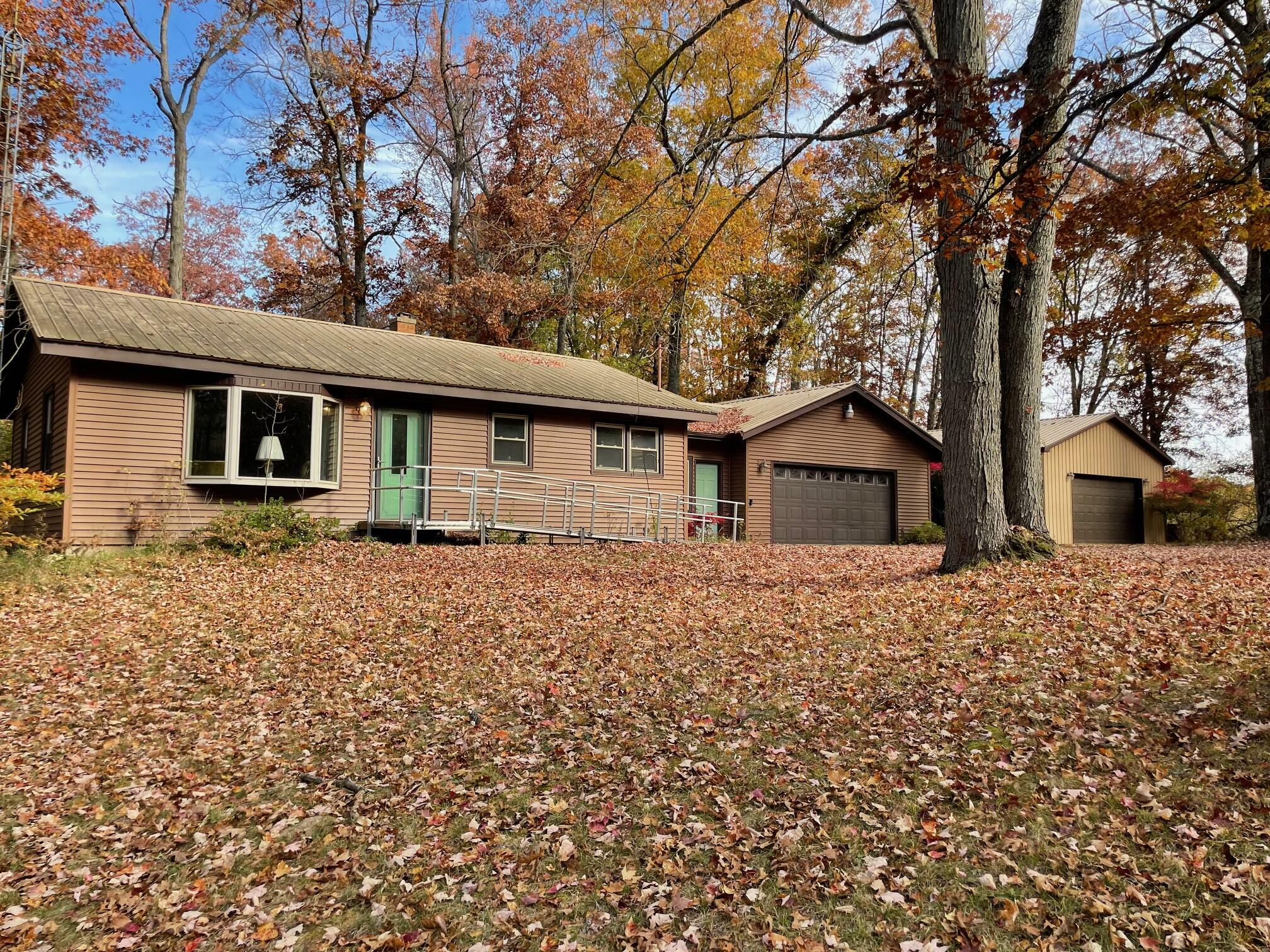 Property Photo:  7468 W 6 1/2 Mile Road  MI 49644 