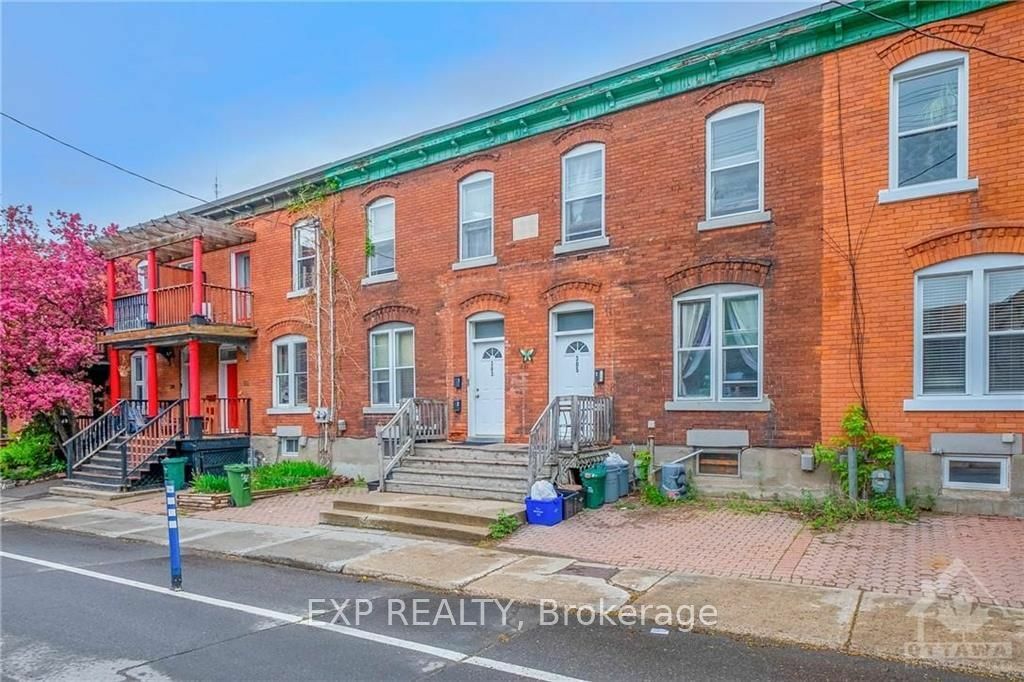 Property Photo:  303-305 Bay St  ON K1R 5Z7 