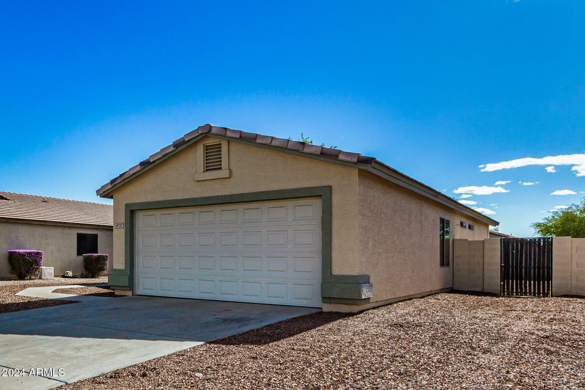 Property Photo:  8757 W Griswold Road  AZ 85345 