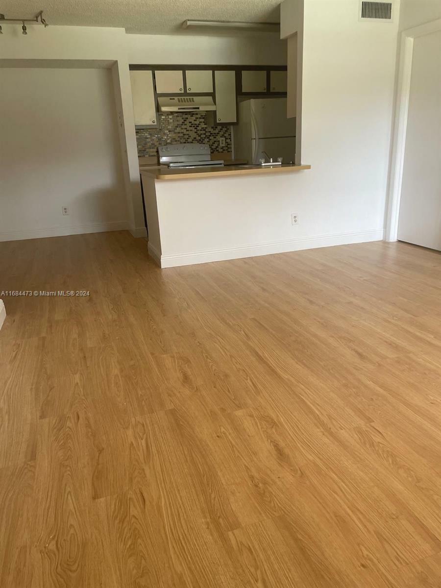 Property Photo:  10476 NW 8th St 104  FL 33026 