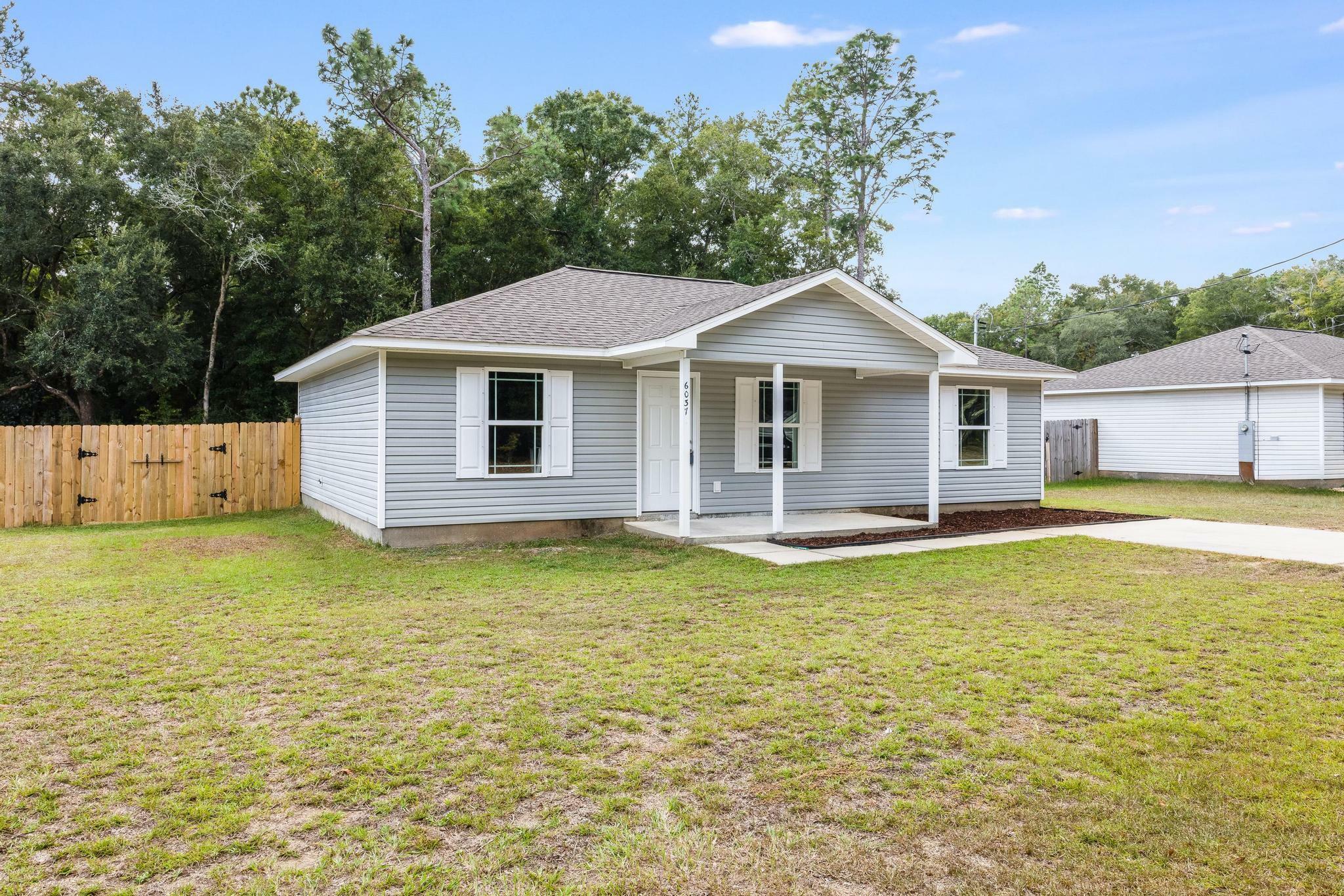 Property Photo:  6037 Children Street  FL 32570 