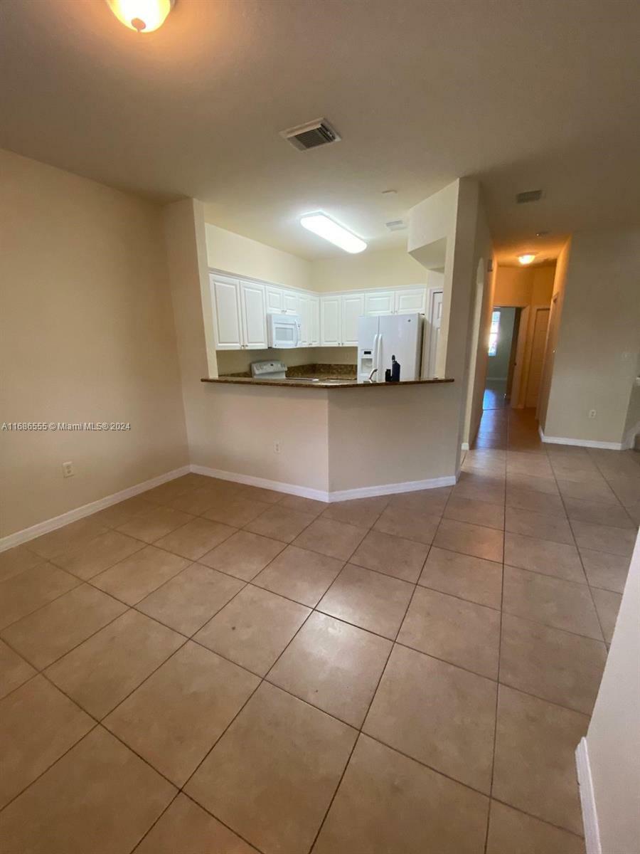 Property Photo:  11886 SW 152nd Pl 11886  FL 33196 