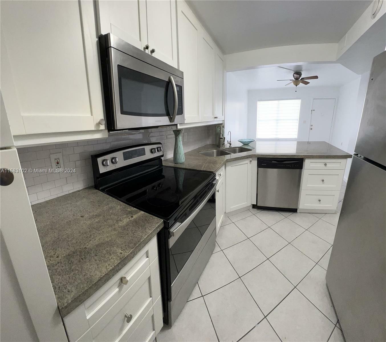 Property Photo:  15322 SW 72nd St 14  FL 33193 