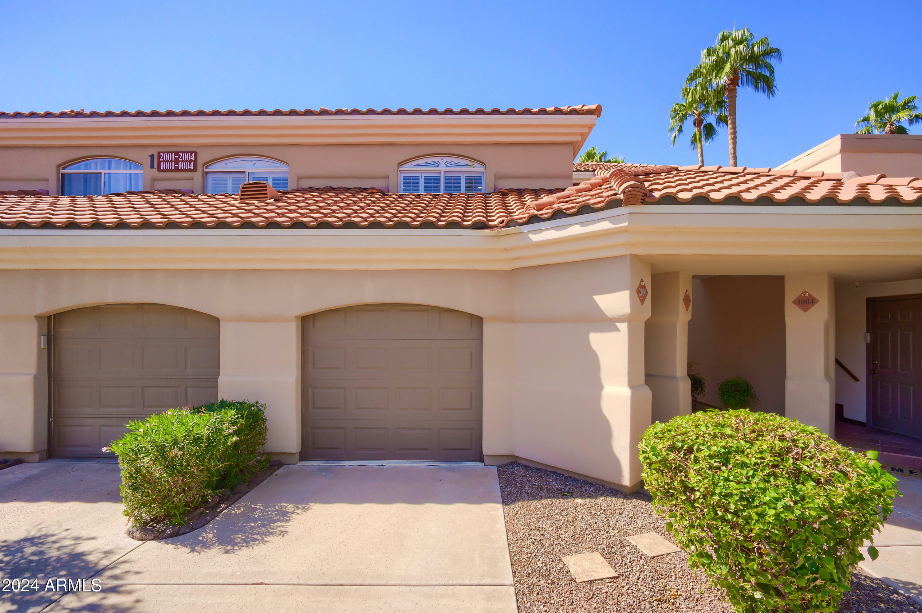 Property Photo:  8653 E Royal Palm Road 2003  AZ 85258 