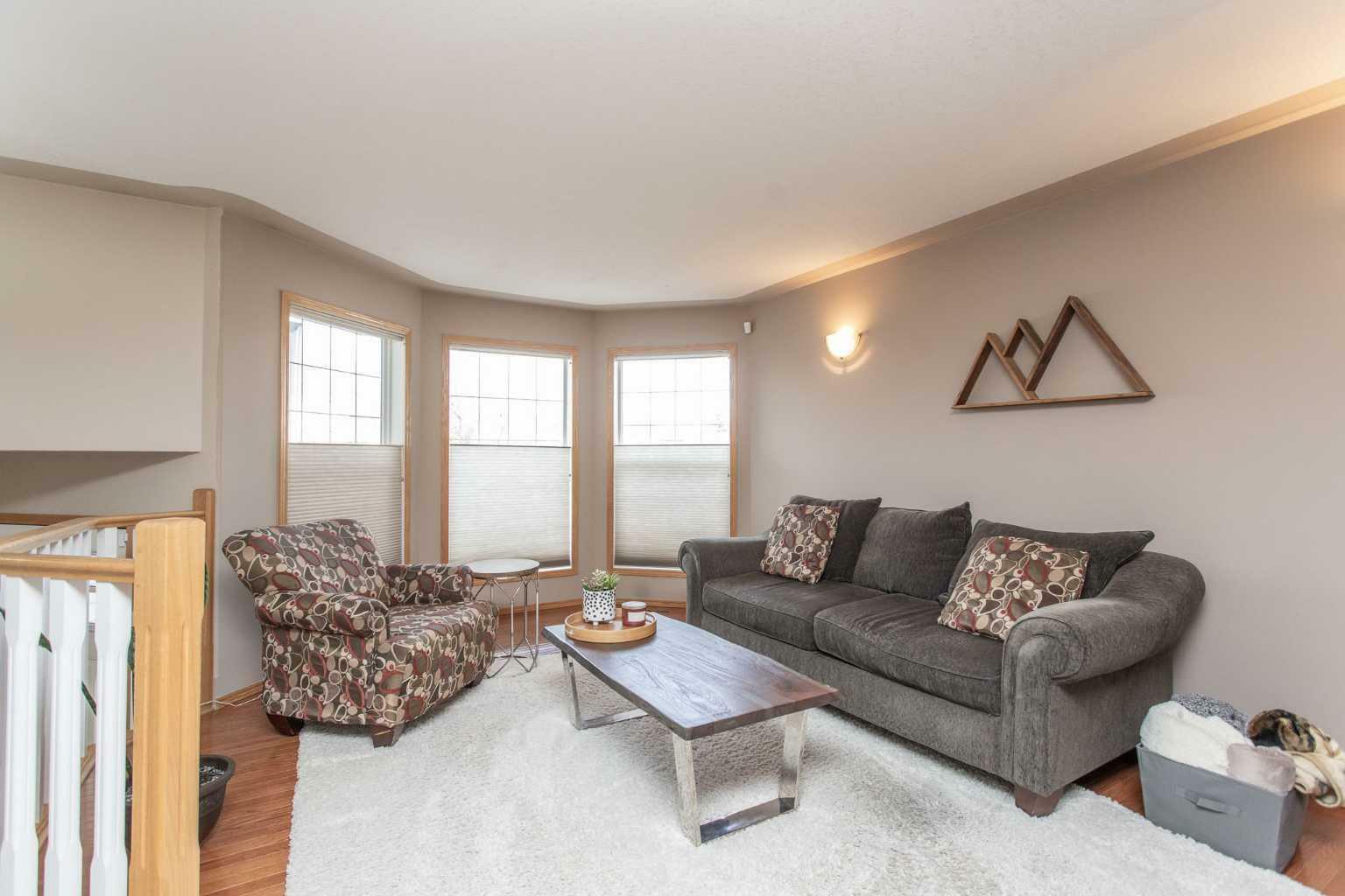 Property Photo:  122 Langford Crescent  AB T4R 3E5 